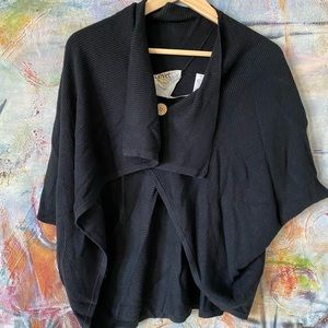 Cardigan with single button. Shawl-like.